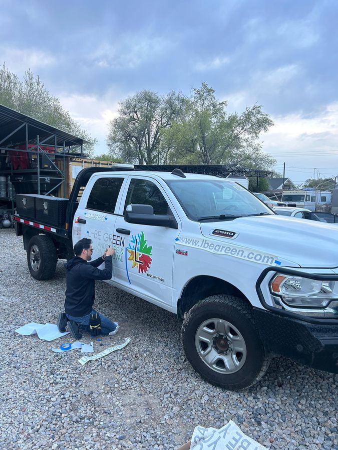 Applying vinyl branding to the truck